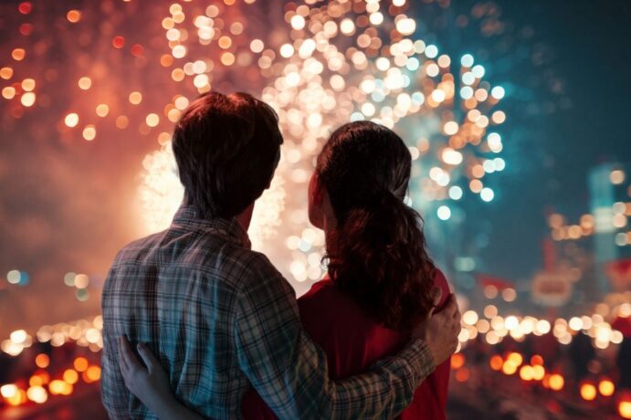 Photo Of A Couple Watching Fireworks At Night